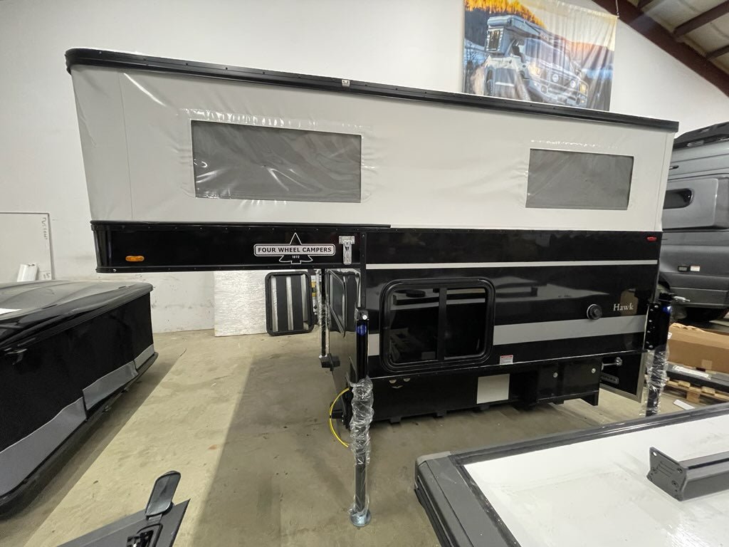 An In-Stock Showroom Inventory: 2025 HAWK Four Wheel Camper Base Model with Front Dinette Floor Plan