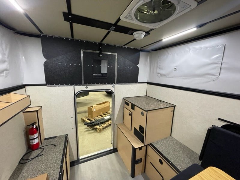 An In-Stock Showroom Inventory: 2025 HAWK Four Wheel Camper Base Model with Front Dinette Floor Plan