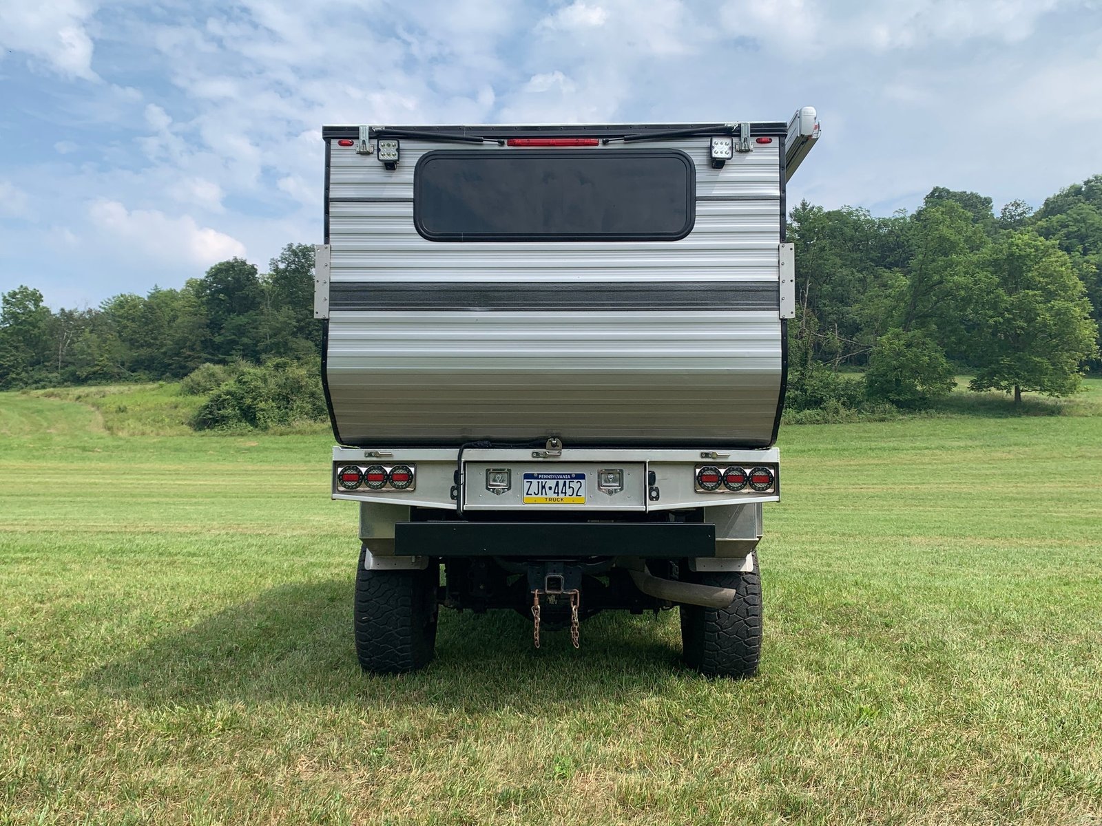 Customer Classified: 2017 RAM 2500 + 2018 HAWK Series Flatbed Four Wheel Camper Combo