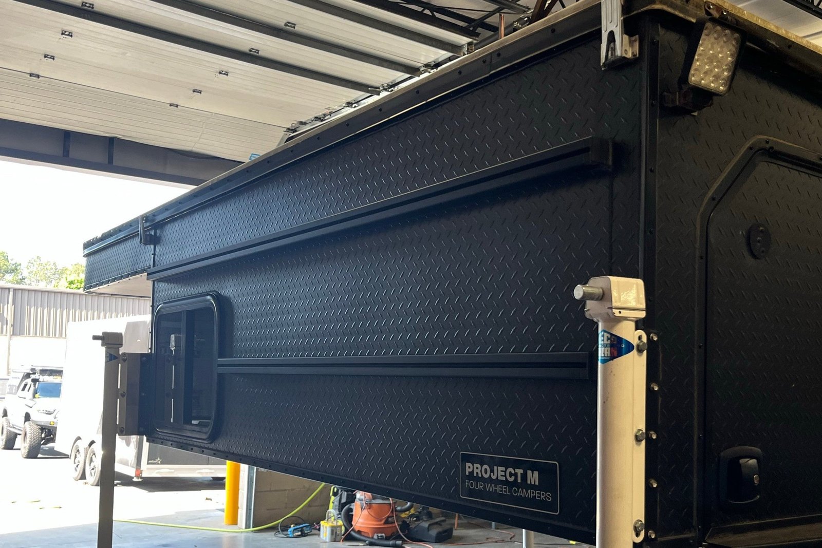 Customer Classified: Used 2023 8' PROJECT M Truck Bed Topper Four Wheel Camper for Full-Size Trucks