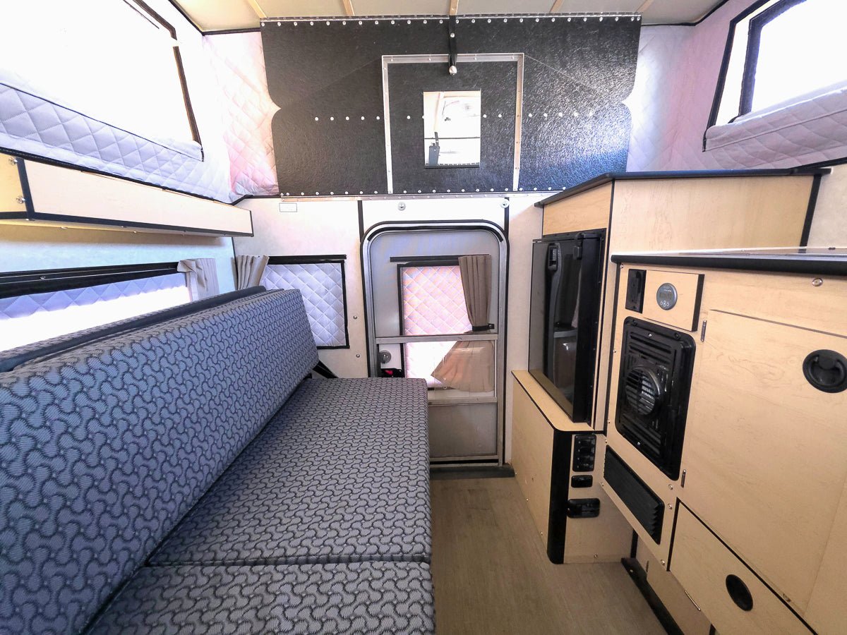 Customer Classified: Used 2023 HAWK Four Wheel Camper with Rollover Couch Floor Plan
